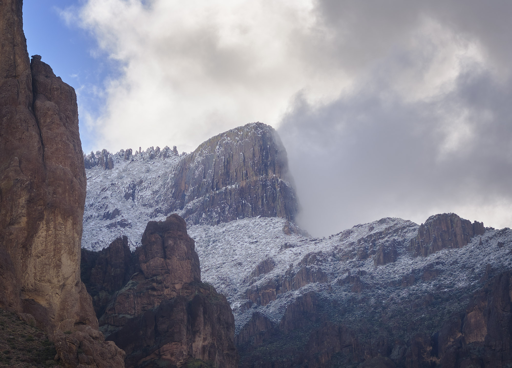Landscape photo of Superstition Mountain in Arizona covered in snow, arizona landscape photography