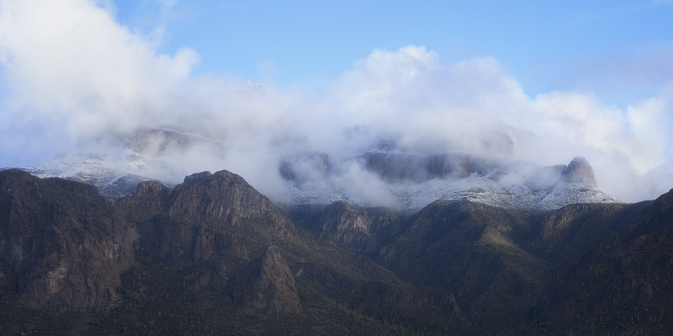 Landscape photo of Superstition Mountain in Arizona covered in snow, arizona landscape photography