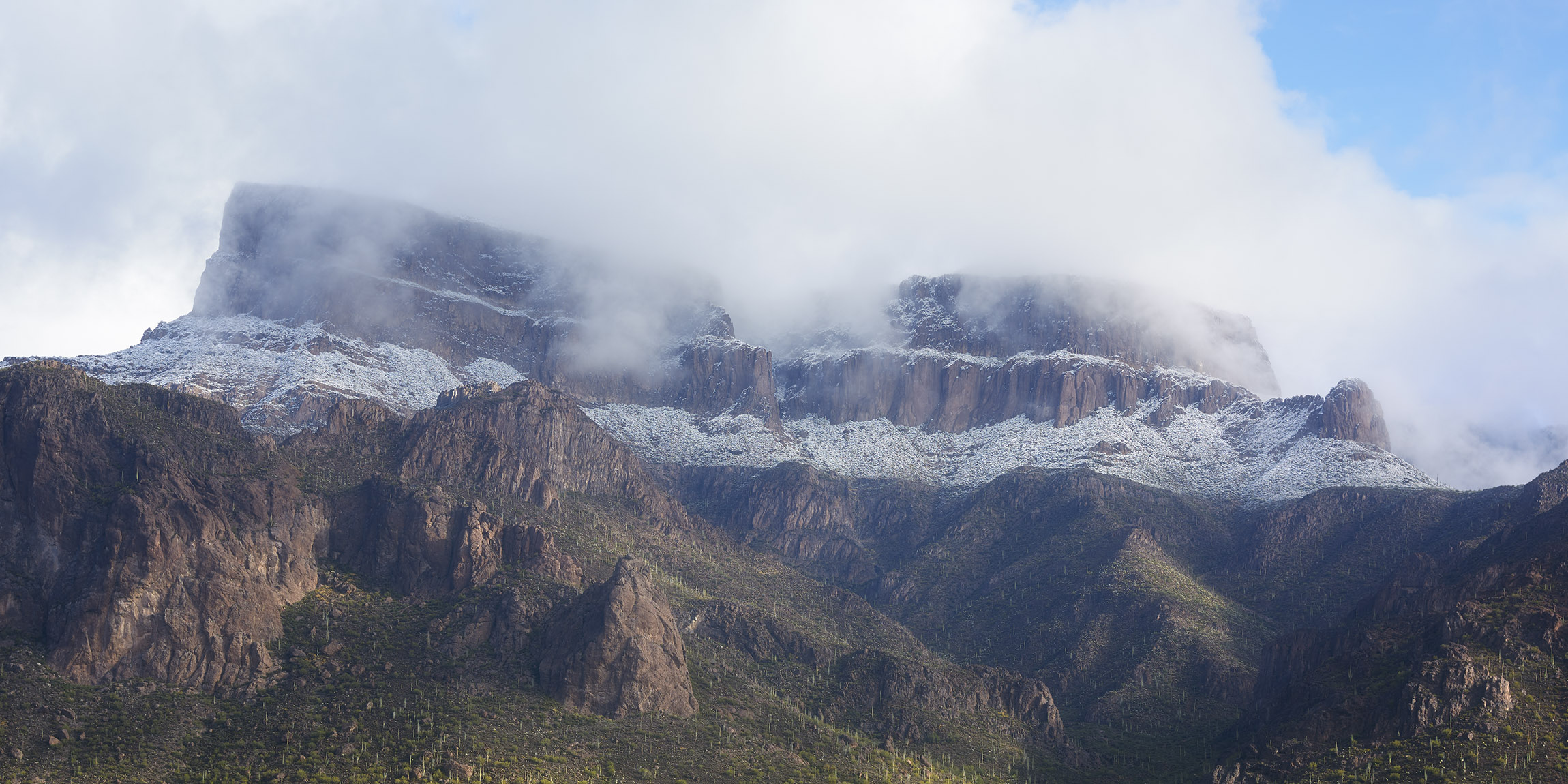 Landscape photo of Superstition Mountain in Arizona covered in snow, arizona landscape photography